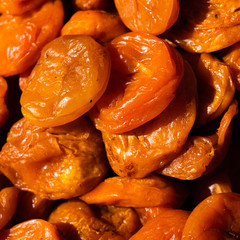 Dried apricots. Macro. Heap of dried apricots close-up.