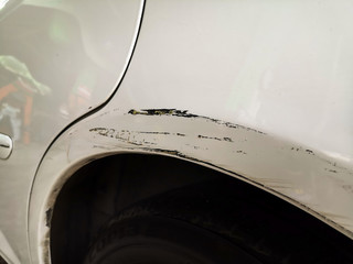 Close up of car scratch, Crashed car in accident.