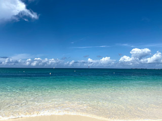 Landscape.Look at the horizon in the open sea from the shore.Beautiful natural background.Line horizon of the blue ocean and sky with clouds.Horizontal, free space, nobody.Concept of natural beauty.