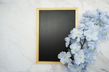 Mock-up flat lay Black board and flower bouquet decoration