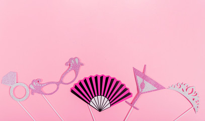 Paper set for photo shoot of a girl on a pink background