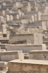 Jerusalem. Stone slabs with stones instead of flowers left by praying for the dead.