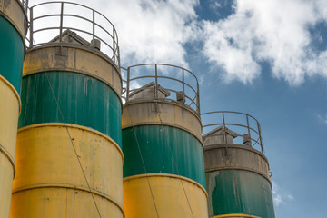 Concrete mixing plant. The upper parts of the towers for the storage of cement