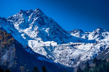 Snow clad Kinner Kailash mountain range of himalaya seen from Kalpa Himachal Pradesh India