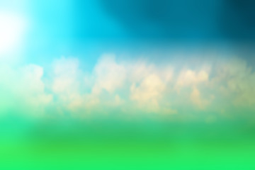 Naklejka na ściany i meble grass sky clouds blurred background, beautiful design spring background