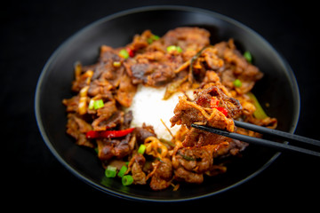 Stir fried with pork and vegetables sprinkle sesame seeds