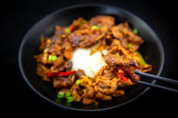 Stir fried with pork and vegetables sprinkle sesame seeds