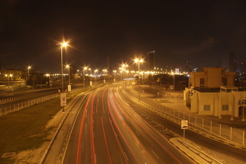 Fototapeta na wymiar traffic in city at night, Bahrain
