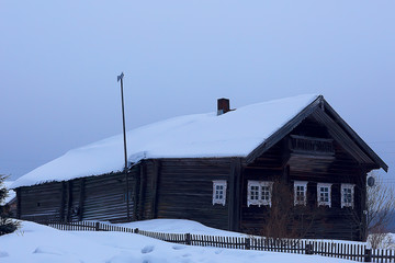 wooden houses in the Russian countryside / wooden architecture, Russian provincial landscape, winter view village in Russia