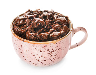 Chocolate mug cake on white background