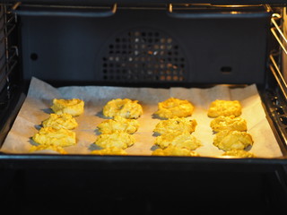 Home cooking. Raw pumpkin cookies with raisins added before baking in the oven.