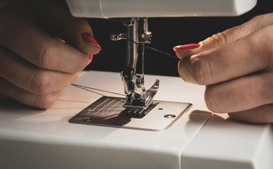 Hands seamstress sewing workflow