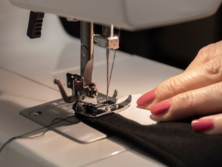 Hands seamstress sewing workflow