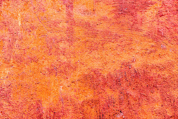 Texture of a concrete wall with cracks and scratches which can be used as a background