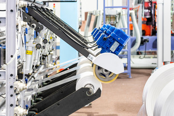 Raw material plastic roll set on feed set of high technology modern and automatic high speed continuous manufacturing process plastic bag sack or plastic envelope making machine for industrial