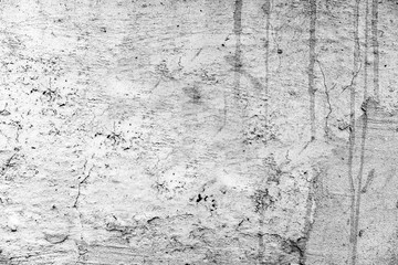Obraz premium Texture of a concrete wall with cracks and scratches which can be used as a background