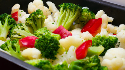 vegetarian food, healthy food. a mixture of vegetables cabbage broccoli cauliflower red bell pepper. fitness, diet, weight loss