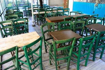 Fototapeta na wymiar Athens, Greece, March 21 2020 - Closed restaurant due to Coronavirus quarantine measures.