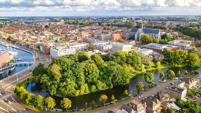 Aerial drone view of Alkmaar town cityscape from above, typical Dutch city skyline with canals and houses, Holland, Netherlands