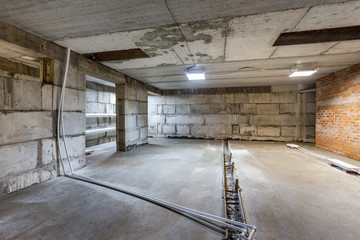 Concrete construction of basement of large building. Ground floor Inside the modern construction...