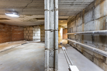 Concrete construction of basement of large building. Ground floor Inside the modern construction...
