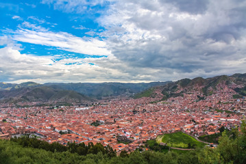 Fototapeta na wymiar Cusco, view of centre and cityscape of city and mountains from above, Peru, South America