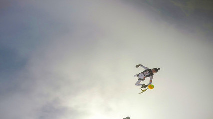 Fototapeta premium Clean. Clear sky under your feet. A professional skydives. The flow of the wind.