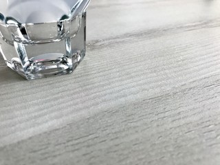 glass of water with ice on black background