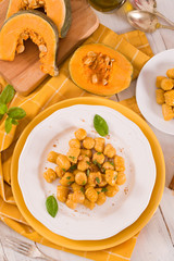 Pumpkin gnocchi with grated amaretti cookies.