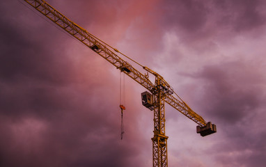 construction crane at sunset