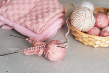 Incomplete knitting project with wooden needles