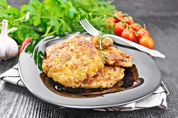 Fritters meat in plate on board