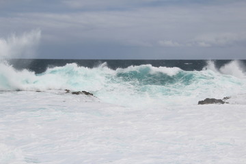 waves crashing on the coast