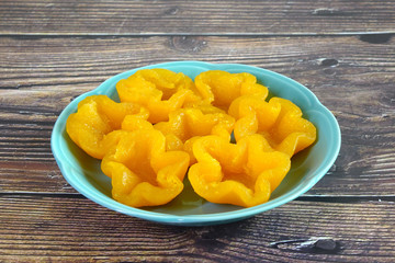 Thai desserts : Golden Thai sweetmeat, Golden petal (Thong Yip), one of Famous nine auspicious desserts in Thai traditional food.