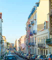 Fototapeta na wymiar Cars Old Town street Lisbon