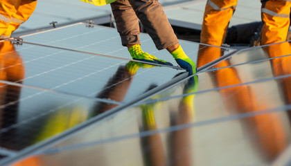 Installation of solar power plant on the rooftop of a building