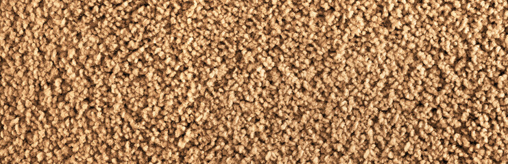 Texture of beige carpet. Panorama. View from above.	
