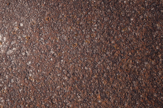 Old rusty sheet of rolled steel. Rough surface