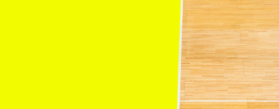 wooden parquet  sport and yellow background with copy space for text and advertisment.