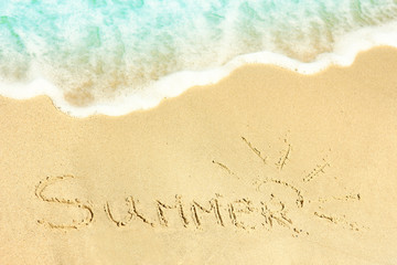 holiday inscription on the beach