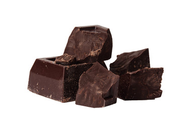 Pieces of black chocolate isolate on a white background close-up, copy space