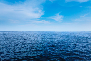 Fototapeta na wymiar Calm Sea and Blue Sky Background.
