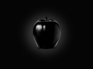 Black apple on a black smooth background