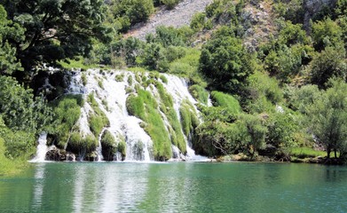 Fototapeta na wymiar rapids and waterfall on the Krupa river, Croatia