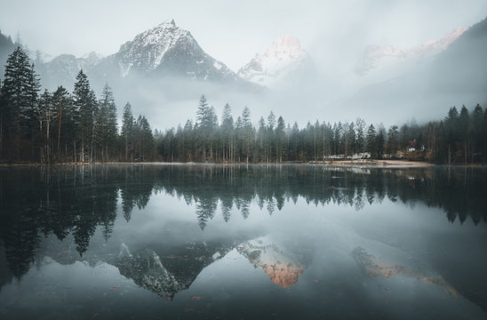 Morning fog over scenery lake at schiederweiher in upper austria