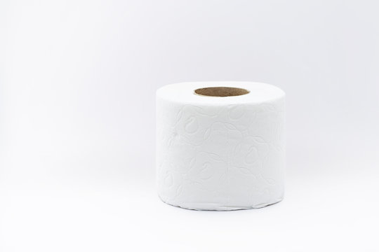 Roll of toilet paper with side texture on a white background