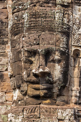 Buddha head on towers of Bayon temple in Angkor Thom, Cambodia