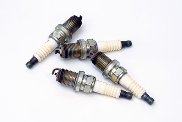 Car spark plug , operating on a white background