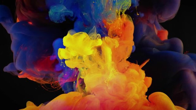 4K, Colorful drops in water, abstract color mix, drop of Ink color mix paint falling on water Colorful ink in water, 4K footage,