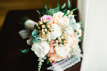 Wonderful luxury wedding bouquet of different flowers